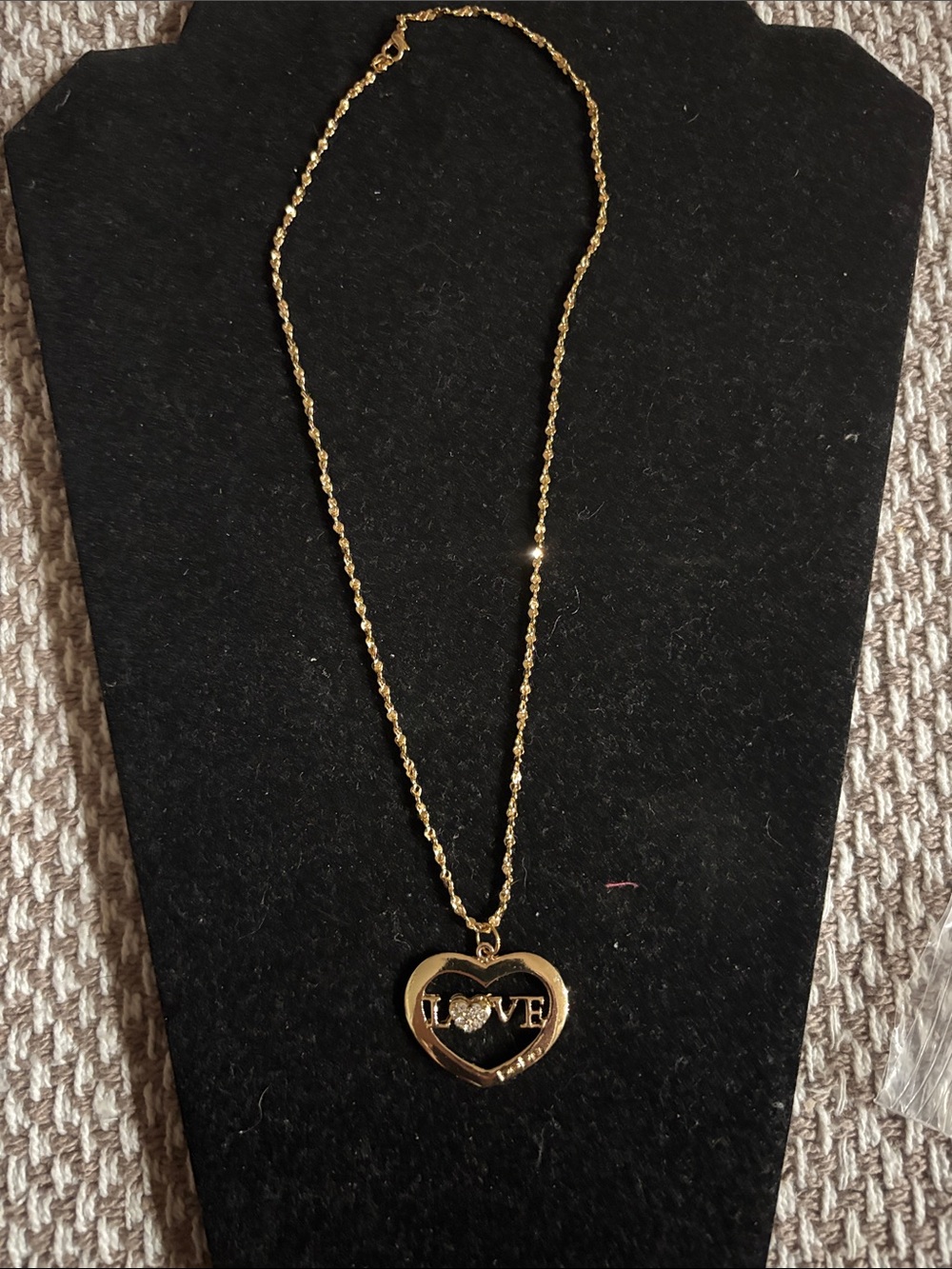 Bebe Goldtone Heart 'LOVE' Pendant Necklace - Elegant Women's Jewelry